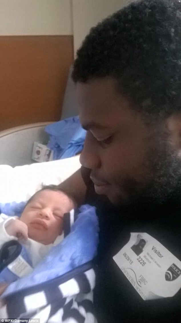 Newborn: Eli, seen here with his father, was just one-day-old when the accident occurred Tuesday