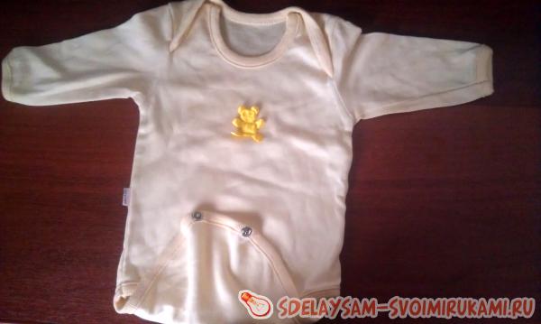 Букет из одежды для новорожденных